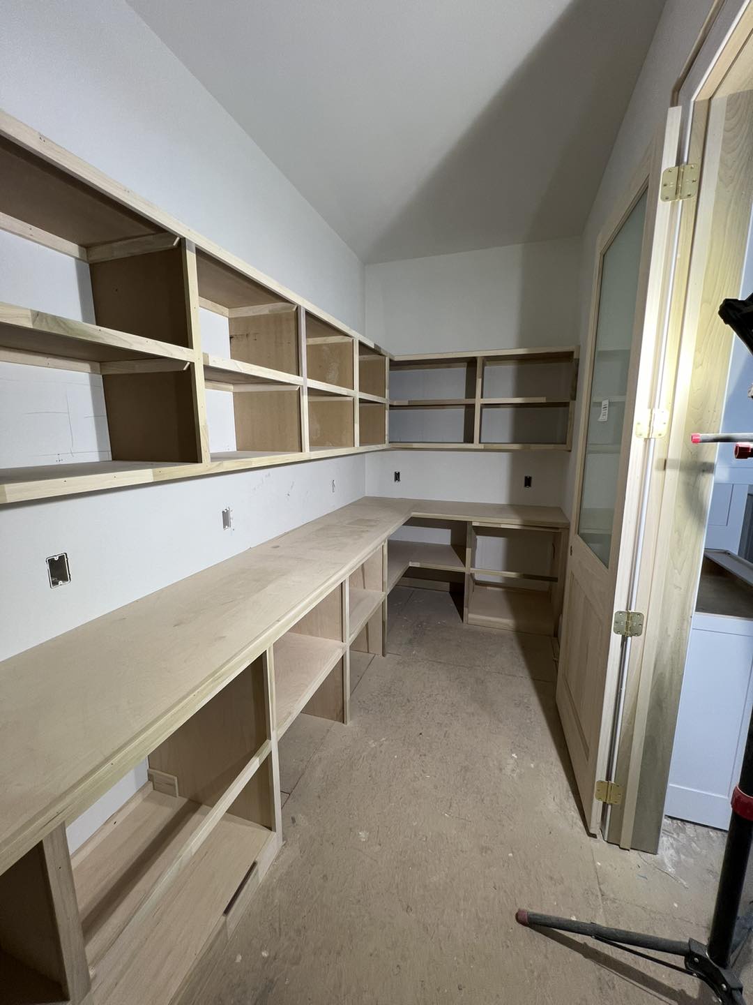 Custom built-in pantry shelving and countertop installation by Ruach Custom Carpentry in Columbus, Ohio, featuring handcrafted open wood shelving, custom lower storage cabinets, and expansive wood counters for functional kitchen organization. This custom carpentry project showcases expert finish carpentry, custom pantry design, and precision craftsmanship, bringing beautiful and practical storage solutions to a luxury Central Ohio home.